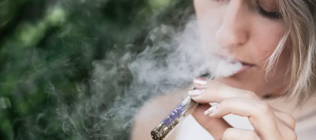 Teen smoking cannabis
